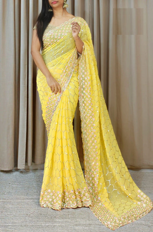 Beautiful faux Georgette with sequence work yellow saree - Laxmisaree.com